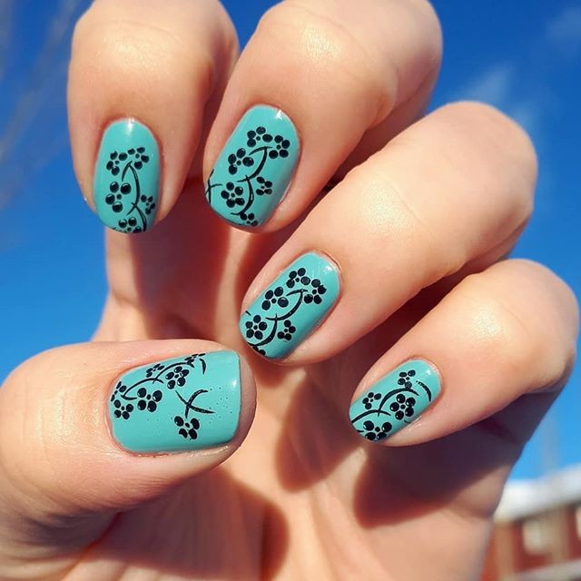 Black Polka Dot Flowers on Turquoise Color