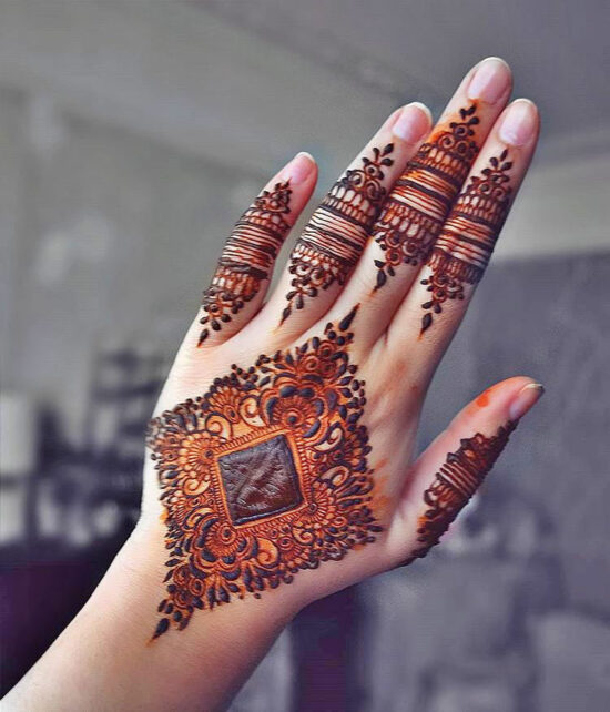 Back hand Buta mehndi design